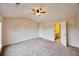 Spacious bedroom featuring neutral walls, carpet, and a ceiling fan at 3601 Gainesway Trce, Duluth, GA 30096