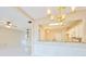 An open living space flows into the dining area with a view of the kitchen, offering an inviting, connected feel at 3601 Gainesway Trce, Duluth, GA 30096