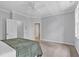 Spacious bedroom showcasing neutral walls, carpet flooring, and a ceiling fan at 4676 Ivygate Se Cir, Atlanta, GA 30339