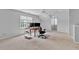 Versatile bonus room with carpet and lots of natural light, perfect for an office or recreation area at 4676 Ivygate Se Cir, Atlanta, GA 30339