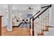 Elegant living room with hardwood floors, a stylish rug, and comfortable seating at 4676 Ivygate Se Cir, Atlanta, GA 30339