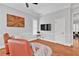 Cozy living room with hardwood floors, artwork, and large windows with white trim at 4676 Ivygate Se Cir, Atlanta, GA 30339