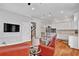 Open concept view of kitchen and living room featuring hardwood floors and light gray walls at 4676 Ivygate Se Cir, Atlanta, GA 30339