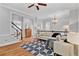 Stylish living room with hardwood floors, comfortable seating, and elegant lighting fixtures at 4676 Ivygate Se Cir, Atlanta, GA 30339