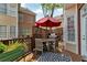 Private outdoor patio with dining table, grill, and privacy fence at 4676 Ivygate Se Cir, Atlanta, GA 30339