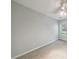 This bedroom features neutral walls, carpet, and a ceiling fan at 4844 W Park Cir # 4844, College Park, GA 30349
