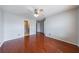 This bedroom features hardwood floors and access to both the bathroom and closet at 4844 W Park Cir # 4844, College Park, GA 30349