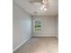 This carpeted bedroom features neutral walls, trim, and a window at 4844 W Park Cir # 4844, College Park, GA 30349