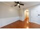 Classic dining room boasting hardwood floors, wainscoting, and neutral paint throughout at 4844 W Park Cir # 4844, College Park, GA 30349