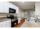Well-appointed kitchen with stainless steel appliances and modern granite countertops at 4844 W Park Cir # 4844, College Park, GA 30349