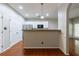 Modern kitchen with stainless steel appliances, white cabinets, and granite countertops at 4844 W Park Cir # 4844, College Park, GA 30349