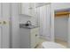Cozy bathroom with a granite countertop vanity and a shower/tub combo at 55 Fox Chase, Covington, GA 30016