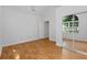 Bright bedroom featuring hardwood floors, ample natural light, and closet space at 55 Fox Chase, Covington, GA 30016