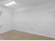 Walk-in closet with carpeted floors and wire shelving at 55 Fox Chase, Covington, GA 30016