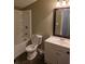 Functional bathroom with a combined tub and shower and a single sink vanity at 5826 Par Four Ct, Lithonia, GA 30038