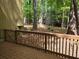 Wooden deck overlooks wooded scenery at 5826 Par Four Ct, Lithonia, GA 30038