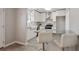 Modern kitchen featuring white cabinets, stainless steel appliances, and granite countertops at 107 Woodberry Ct, Woodstock, GA 30188
