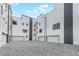 Townhome rear featuring private garages and a modern aesthetic at 1954 8Th St, Chamblee, GA 30341