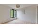 This bright bedroom offers hardwood floors and a black window frame at 1954 8Th St, Chamblee, GA 30341