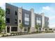 A modern townhome with black and brick facade at 1954 8Th St, Chamblee, GA 30341