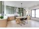 Bright, spacious kitchen with a marble island, green cabinets, and modern pendant lighting at 1954 8Th St, Chamblee, GA 30341