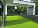 Bright rooftop terrace featuring artificial turf and a covered area with recessed lighting at 1954 8Th St, Chamblee, GA 30341