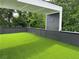 Bright rooftop terrace featuring artificial turf and a covered area with recessed lighting at 1954 8Th St, Chamblee, GA 30341