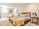 Comfortable bedroom with a bed, side tables, stylish lamps and a patterned rug at 2568 Laurelwood Rd, Atlanta, GA 30360