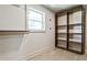 Spacious walk-in closet with custom shelving and ample storage space at 2568 Laurelwood Rd, Atlanta, GA 30360