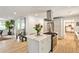 Modern kitchen with a central island, stainless steel appliances, and an open layout for entertaining at 2568 Laurelwood Rd, Atlanta, GA 30360
