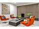 Stylish living room with modern furnishings, fireplace, and decorative wall art at 2568 Laurelwood Rd, Atlanta, GA 30360