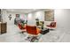 Inviting living room with seating area, dining space, and decorative art pieces at 2568 Laurelwood Rd, Atlanta, GA 30360