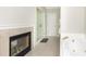 Bright bathroom featuring a fireplace, soaking tub, and glass-enclosed shower at 2610 Oglethorpe Ne Cir, Brookhaven, GA 30319