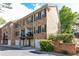 Brick townhome with garage and black shutters at 2610 Oglethorpe Ne Cir, Brookhaven, GA 30319