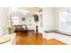 Cozy living room with hardwood floors, built-in shelving, a fireplace, and comfortable seating at 2610 Oglethorpe Ne Cir, Brookhaven, GA 30319