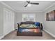 Inviting bedroom with natural light, pull-out bed frame, and ample closet space at 2716 Georgia 16, Carrollton, GA 30116