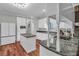Updated kitchen features white cabinets, stainless steel appliances and an island with granite countertops at 2716 Georgia 16, Carrollton, GA 30116