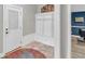Mud room featuring three white cubbies and tile flooring at 2716 Georgia 16, Carrollton, GA 30116