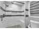 Modern bathroom offering a glass-enclosed shower with tiled walls and built-in bench at 2716 Georgia 16, Carrollton, GA 30116
