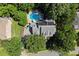 Aerial view showcasing a home with a private pool and solar panels at 2936 Summitop Ne Rd, Marietta, GA 30066