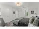 Well-lit bedroom with warm lighting and comfortable bedding at 2936 Summitop Ne Rd, Marietta, GA 30066