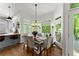 Charming dining area with natural light and an adjacent modern kitchen at 2936 Summitop Ne Rd, Marietta, GA 30066
