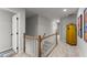 Upstairs hallway featuring neutral walls, carpet, white railings and natural light at 2936 Summitop Ne Rd, Marietta, GA 30066