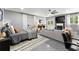 Spacious living room with fireplace, seating area, bed, and an abundance of natural light creating an inviting atmosphere at 2936 Summitop Ne Rd, Marietta, GA 30066