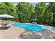 Beautifully maintained in-ground pool with a manicured lawn, perfect for summer fun and relaxation at 2936 Summitop Ne Rd, Marietta, GA 30066