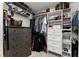 Walk-in closet featuring custom shelving, multiple drawers, and ample storage space at 2936 Summitop Ne Rd, Marietta, GA 30066