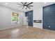 Bedroom with modern fireplace, statement wall, and stained glass window at 378 Grant Park Pl, Atlanta, GA 30315