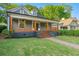 Charming home featuring a covered porch with wooden details at 378 Grant Park Pl, Atlanta, GA 30315