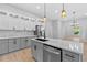 Spacious kitchen with a large island, stainless steel appliances, and pendant lighting at 378 Grant Park Pl, Atlanta, GA 30315