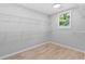 Spacious walk-in closet provides ample storage with shelving and a window for natural light at 378 Grant Park Pl, Atlanta, GA 30315